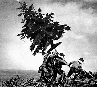 planting a Christmas tree like the depiction of raising flag on iwo jima