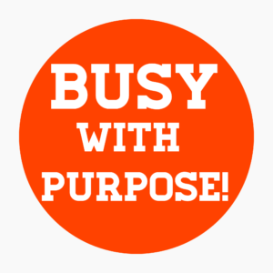 orange circle with busy with purpose in white